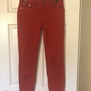 Womens burnt orange skinny jeans.